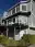Three-story deck side of a Chuckanut home after exterior painting