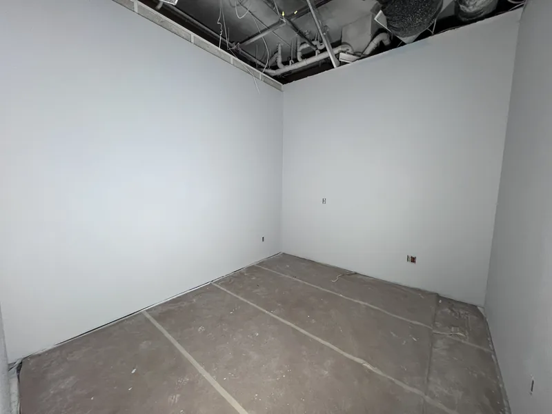 Finished light blue commercial office in Fairhaven, Bellingham, painted on new drywall.