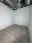 Finished new-construction office with light blue walls and open ceiling in Fairhaven