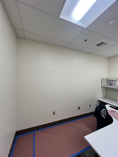 Before repaint—Sunnyland commercial office interior with existing wall colors.