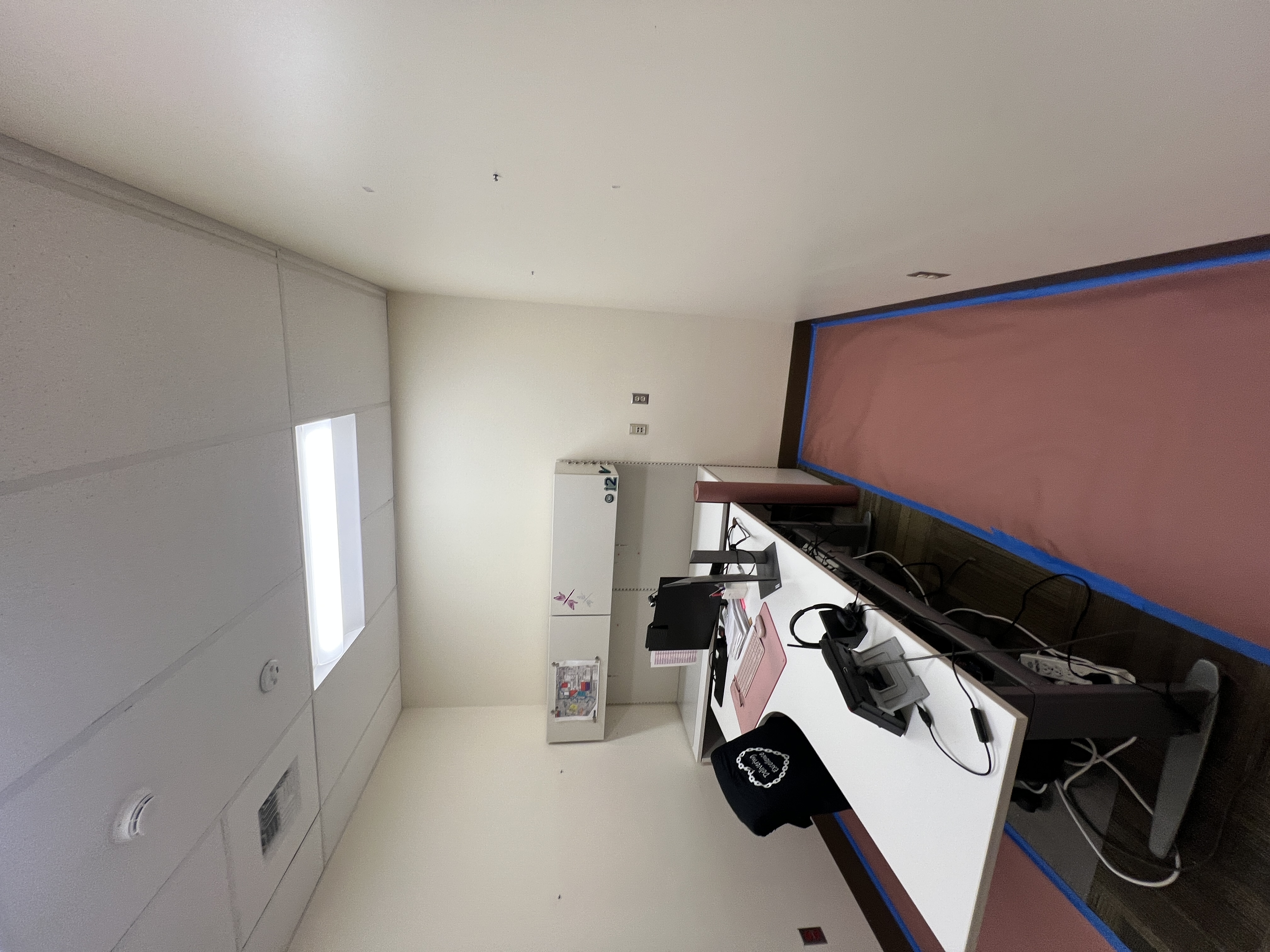 Before repaint—Sunnyland office interior with older paint colors.