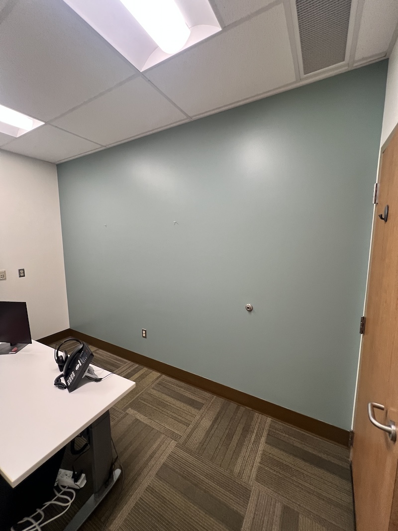 Sunnyland neighborhood commercial office repaint in Bellingham, WA — fresh interior paint with clean cut lines.