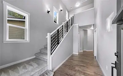 Completed interior living room, stairway, 3-bedroom kitchen repaint in Bellingham with modern wall colors